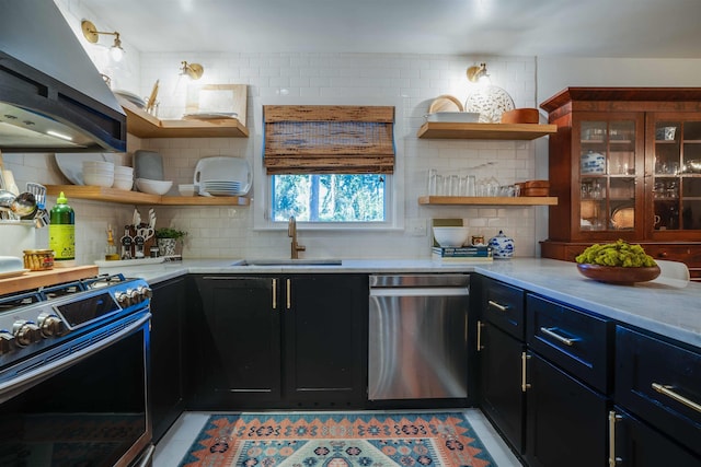 kitchen featuring island range hood, stainless steel appliances, decorative backsplash, light tile patterned flooring, and sink