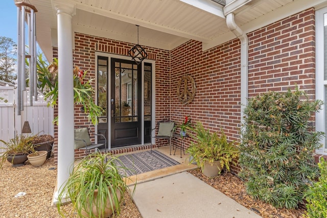 doorway to property featuring covered porch