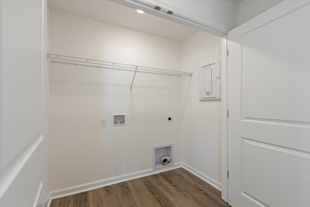 laundry area with hookup for an electric dryer, dark hardwood / wood-style flooring, and washer hookup