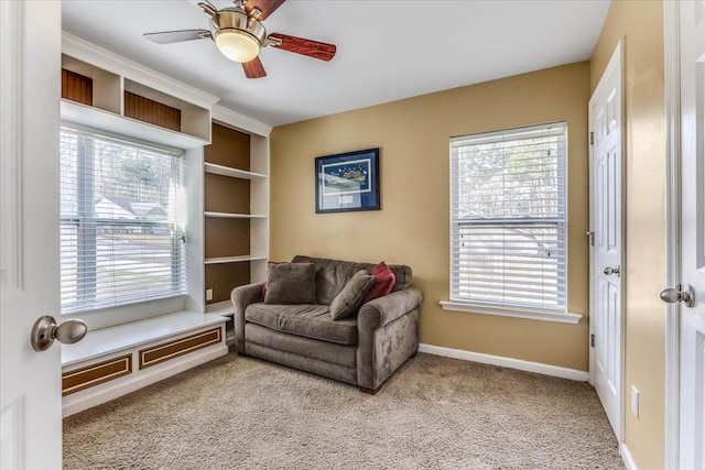 interior space featuring ceiling fan