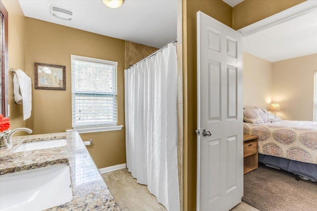 bathroom featuring vanity and a shower with curtain