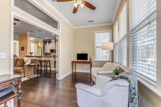 living room with ceiling fan, crown molding, and dark hardwood / wood-style flooring