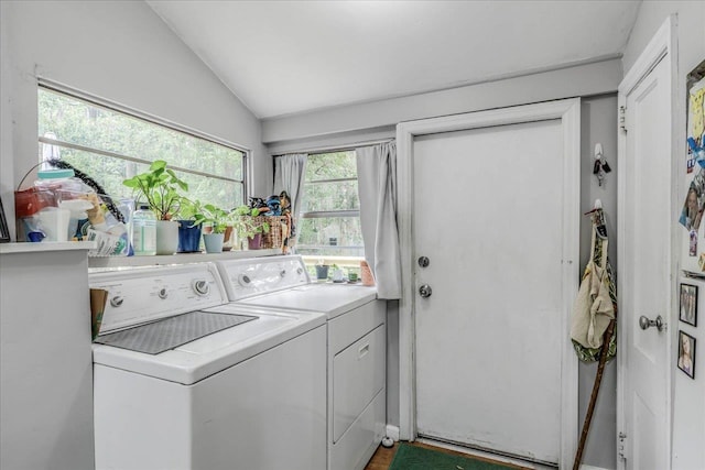 washroom featuring laundry area and independent washer and dryer
