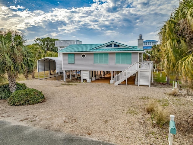 view of front of home featuring a carport