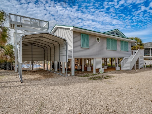 exterior space featuring a carport