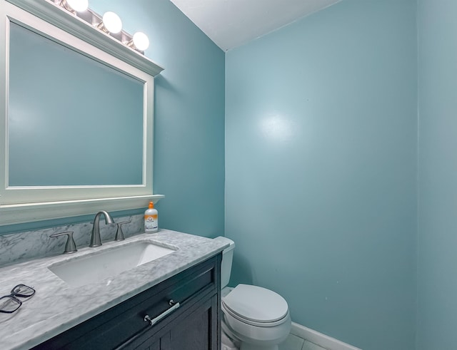 1319 Airport Dr Unit F04, Tallahassee, FL 32304 - bathroom featuring vanity, toilet, and tile patterned flooring