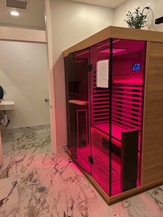 121 N Monroe St Unit 8007, Tallahassee, FL 32301 - relaxing sauna / steam room featuring marble finish flooring, baseboards, and recessed lighting
