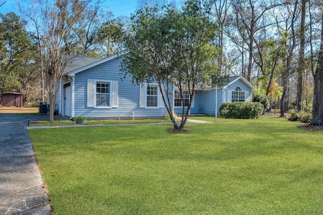 ranch-style house with a front lawn