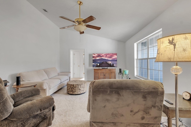 living room with carpet floors, vaulted ceiling, and ceiling fan