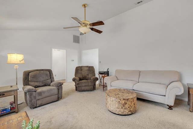 carpeted living room featuring high vaulted ceiling and ceiling fan