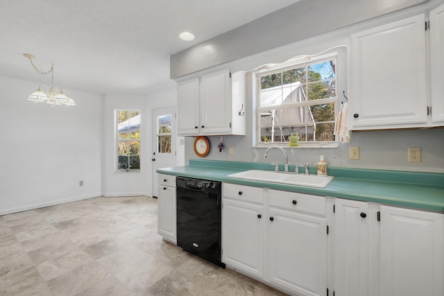 kitchen featuring white cabinetry, pendant lighting, black dishwasher, and sink