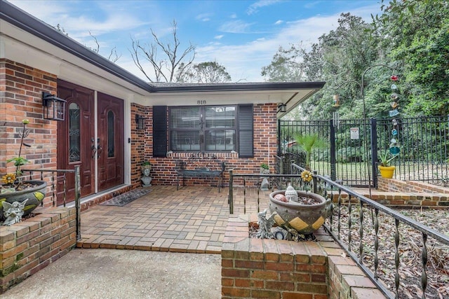 view of patio / terrace featuring fence