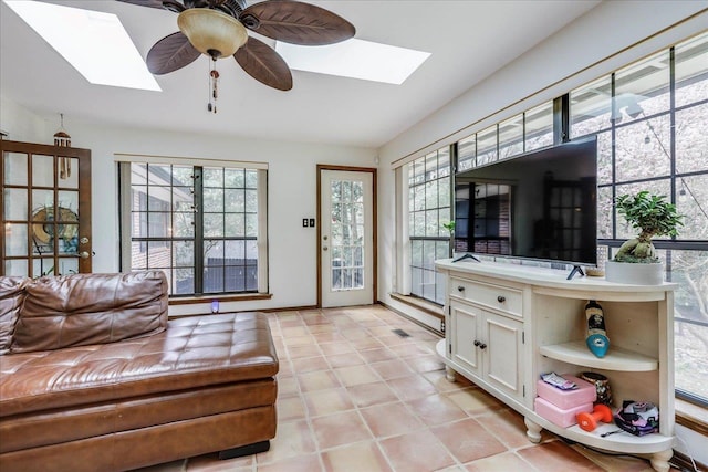818 Watt Dr, Tallahassee, FL 32303 - living area with a skylight and ceiling fan