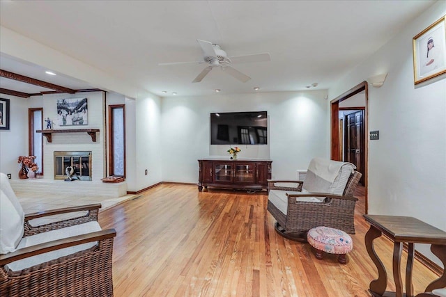 818 Watt Dr, Tallahassee, FL 32303 - living room featuring recessed lighting, a ceiling fan, baseboards, a brick fireplace, and light wood finished floors