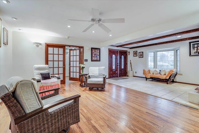 818 Watt Dr, Tallahassee, FL 32303 - living area with recessed lighting, visible vents, baseboards, french doors, and light wood finished floors