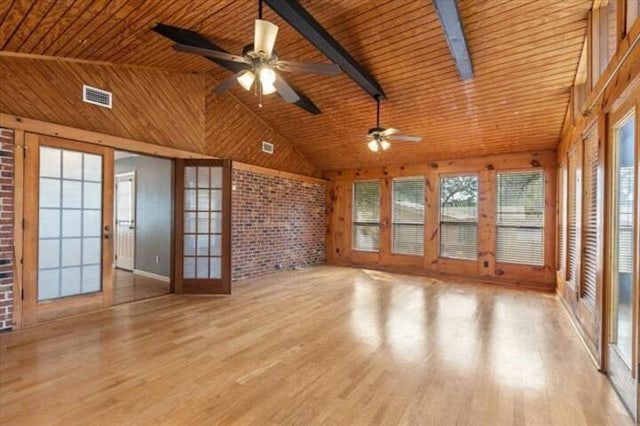 interior space with visible vents, wooden ceiling, brick wall, light wood-style floors, and high vaulted ceiling