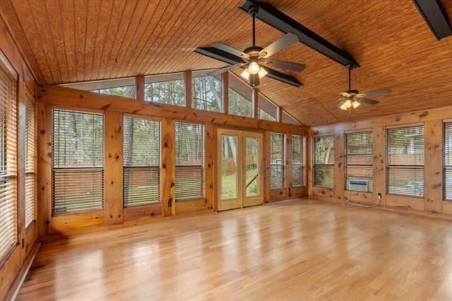 unfurnished sunroom with wooden ceiling, vaulted ceiling, and ceiling fan