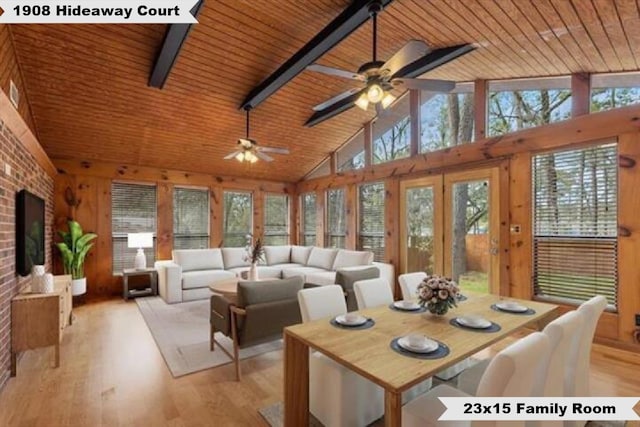 living room with high vaulted ceiling, wood ceiling, light wood finished floors, and beam ceiling