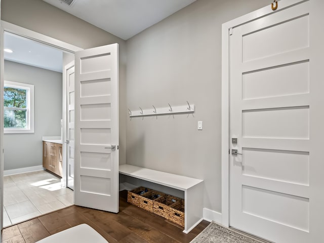 mudroom featuring dark hardwood / wood-style flooring