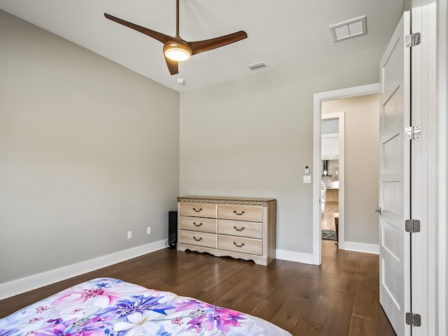 bedroom featuring ceiling fan and dark hardwood / wood-style floors