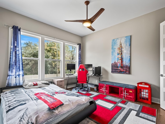 bedroom featuring ceiling fan and wood-type flooring