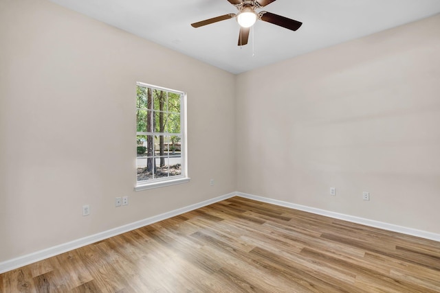 unfurnished room with ceiling fan and light hardwood / wood-style floors