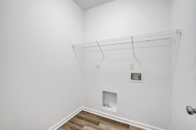 laundry area with hardwood / wood-style flooring, washer hookup, and hookup for an electric dryer