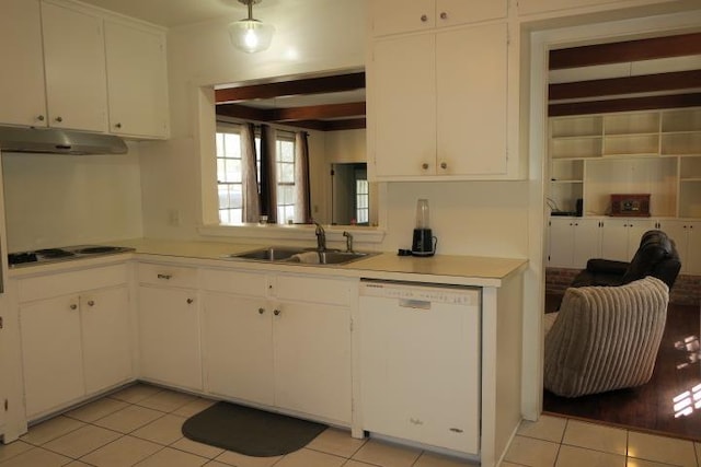 kitchen featuring sink, white appliances, white cabinets, and light tile patterned floors