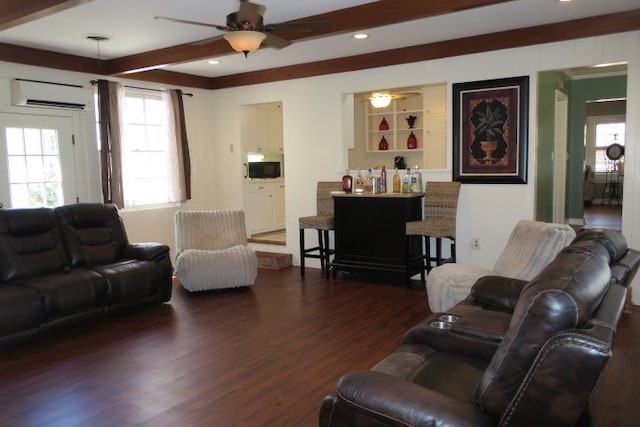 living room with beam ceiling, ceiling fan, dark hardwood / wood-style flooring, and a wall mounted air conditioner