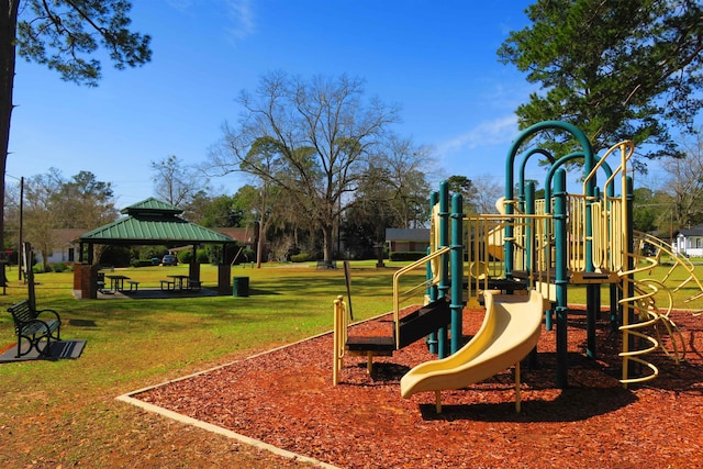 view of playground with a yard and a gazebo