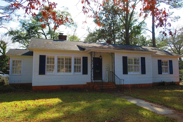 ranch-style house with a front yard