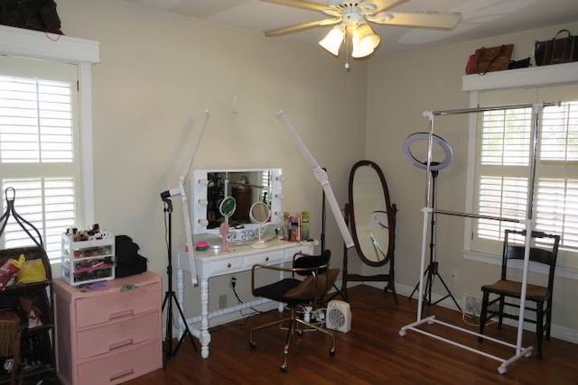 miscellaneous room featuring ceiling fan and dark hardwood / wood-style flooring