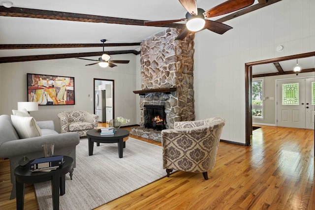 2521 Harriman Cir, Tallahassee, FL 32308 - living area with ceiling fan, light wood-type flooring, and a stone fireplace
