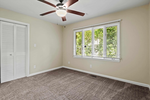 2521 Harriman Cir, Tallahassee, FL 32308 - unfurnished bedroom with carpet floors, a closet, and ceiling fan