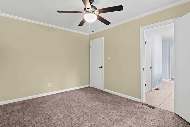 2521 Harriman Cir, Tallahassee, FL 32308 - spare room featuring a ceiling fan, light colored carpet, and ornamental molding