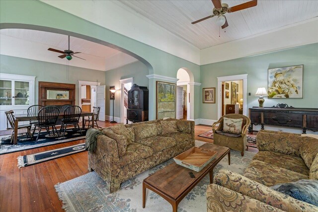 727 Miccosukee Rd, Tallahassee, FL 32308 - living area featuring a ceiling fan, ornate columns, hardwood / wood-style flooring, and arched walkways