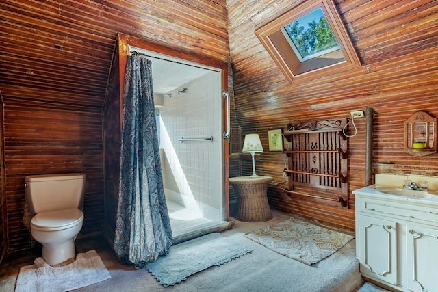 bathroom with wooden walls, toilet, and a skylight