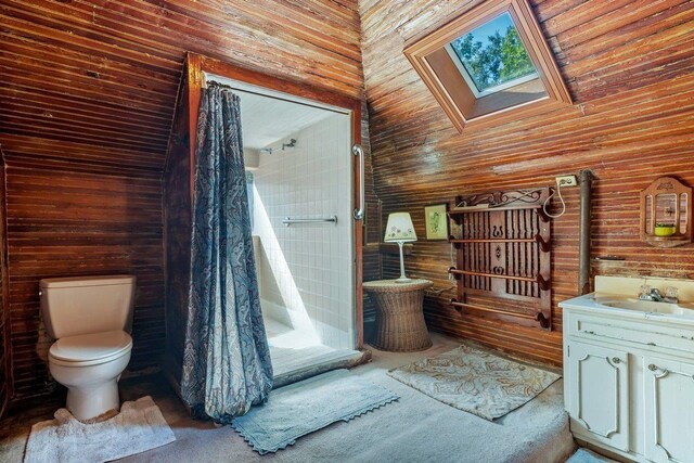 727 Miccosukee Rd, Tallahassee, FL 32308 - full bathroom featuring wooden walls, a shower with shower curtain, vanity, toilet, and a skylight