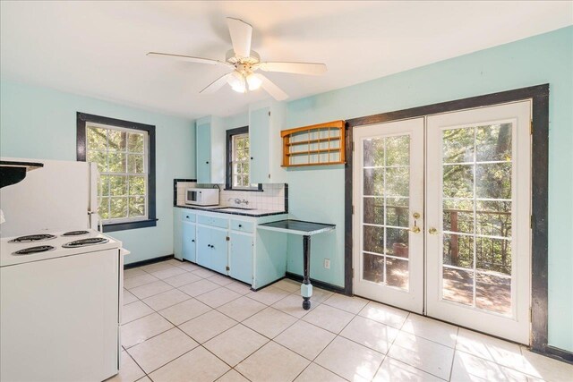 727 Miccosukee Rd, Tallahassee, FL 32308 - kitchen featuring white appliances, tasteful backsplash, french doors, a ceiling fan, and light tile patterned floors