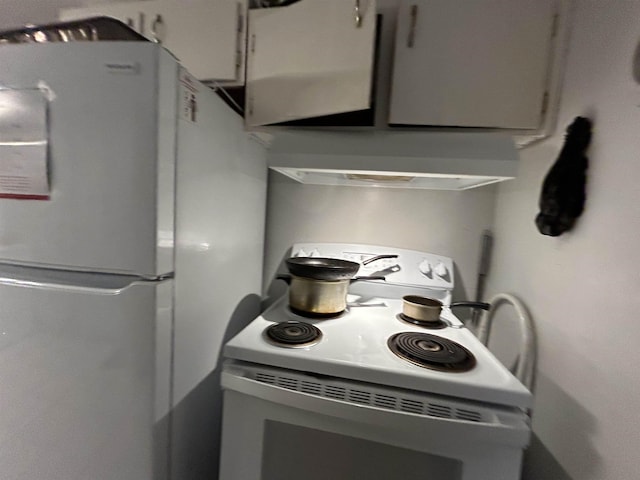 1518 Mabry St, Tallahassee, FL 32310 - kitchen with under cabinet range hood and white appliances