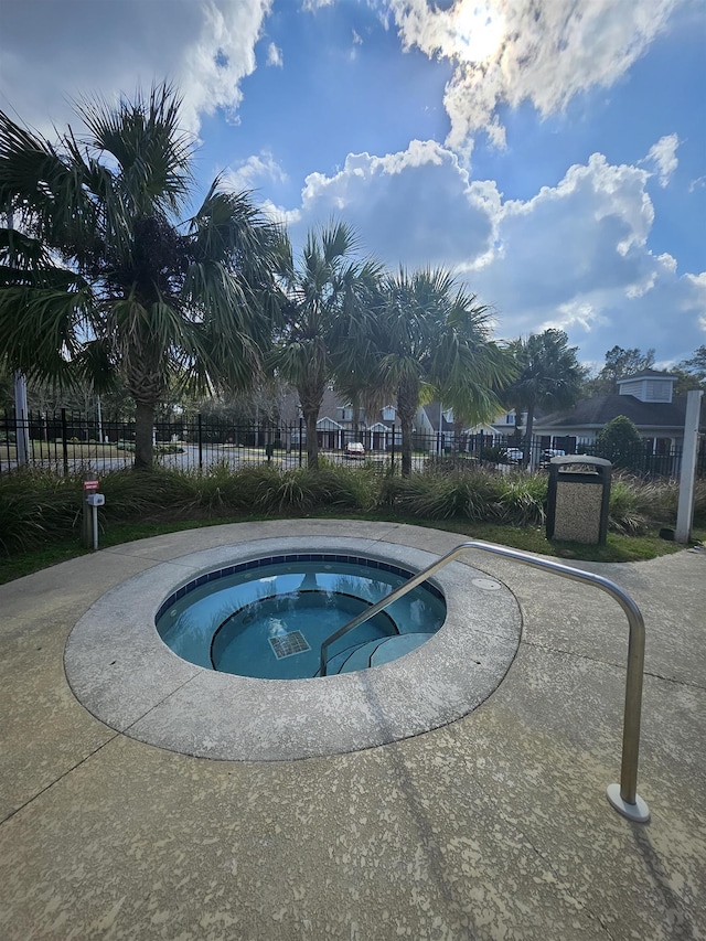 view of pool featuring a community hot tub