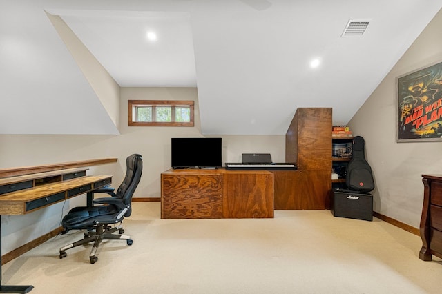 carpeted office space featuring baseboards and visible vents