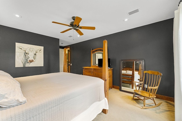 bedroom with light carpet, baseboards, visible vents, and a ceiling fan