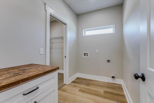 60 Sierra Ln, Crawfordville, FL 32327 - washroom with washer hookup, hookup for an electric dryer, and light wood-style floors