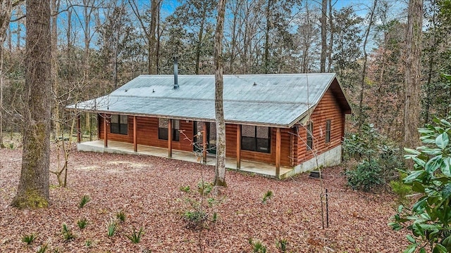 back of property featuring a patio area