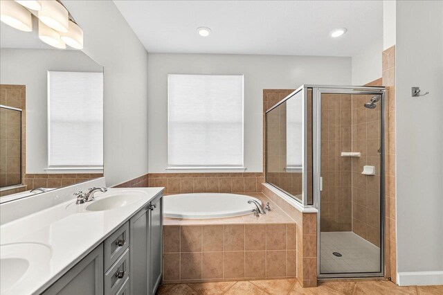 3256 Whitman Way, Tallahassee, FL 32311 - bathroom with a garden tub, a stall shower, double vanity, tile patterned flooring, and recessed lighting