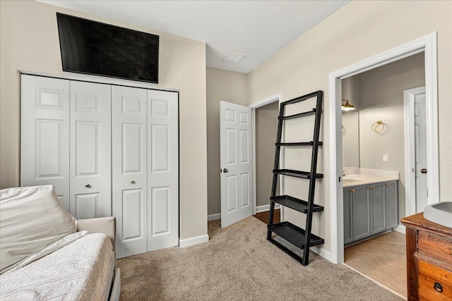 3256 Whitman Way, Tallahassee, FL 32311 - bedroom with a closet and light colored carpet