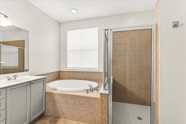 3256 Whitman Way, Tallahassee, FL 32311 - bathroom featuring vanity, a bath, a shower stall, and tile patterned flooring