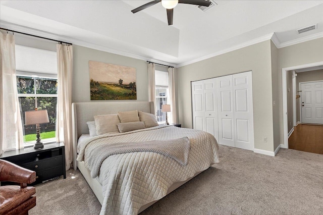 3256 Whitman Way, Tallahassee, FL 32311 - bedroom featuring carpet floors, crown molding, multiple windows, a closet, and ceiling fan