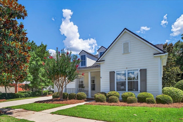 3256 Whitman Way, Tallahassee, FL 32311 - view of front of property with covered porch and a front yard